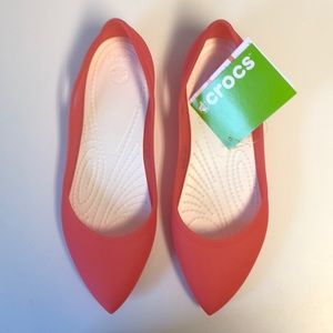 Crocs rio flat size 10 in coral.